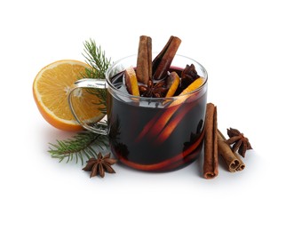 Photo of Tasty mulled wine, spices, orange and fir branches isolated on white. Christmas drink