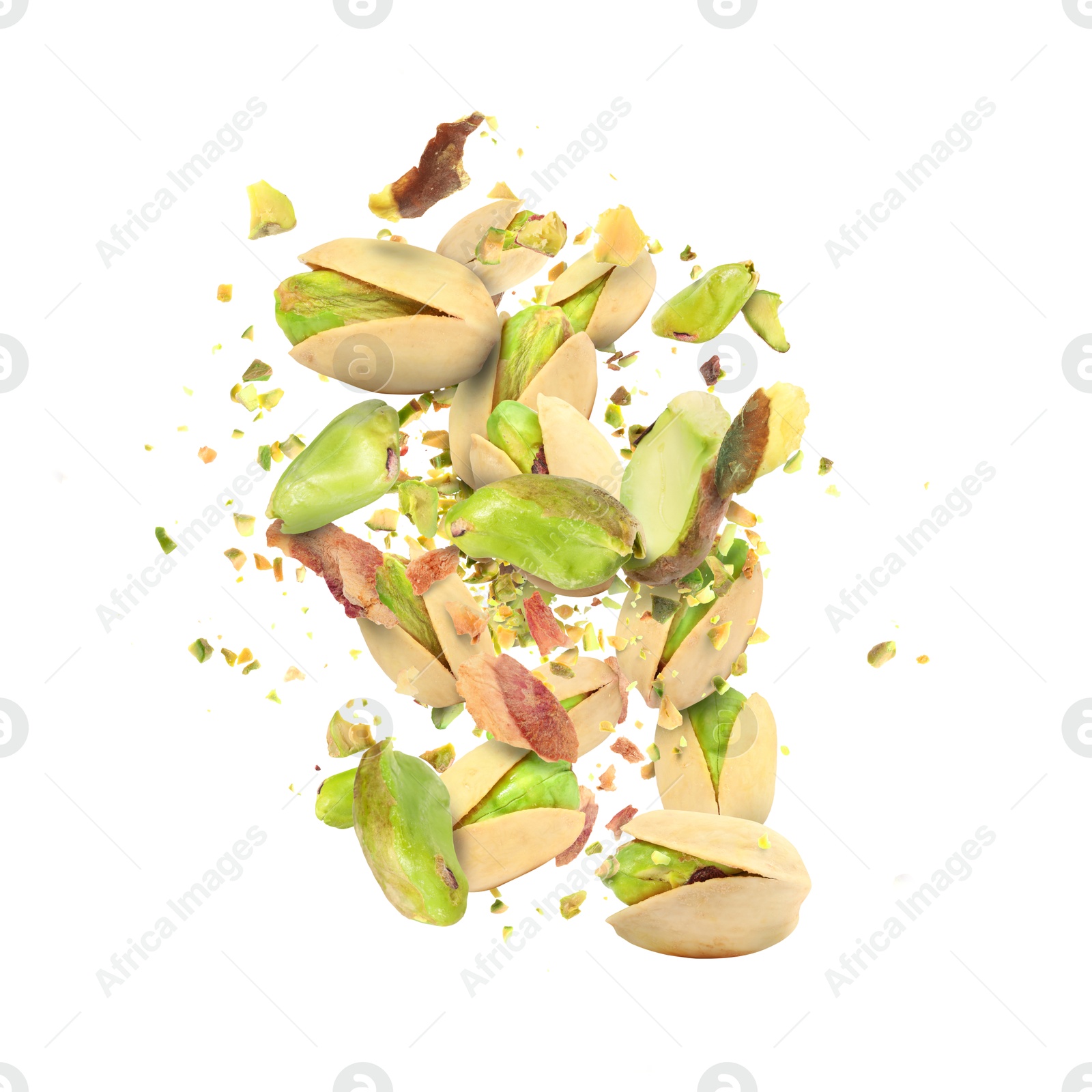 Image of Tasty pistachios with cracked nutshell in air on white background