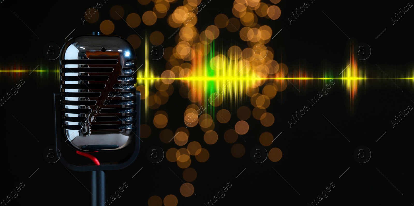 Image of Sound wave and microphone against black background with blurred lights. Banner design