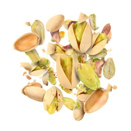 Image of Tasty pistachios with cracked nutshell in air on white background