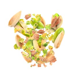 Image of Tasty pistachios with cracked nutshell in air on white background