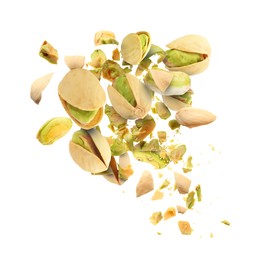 Image of Tasty pistachios with cracked nutshell in air on white background