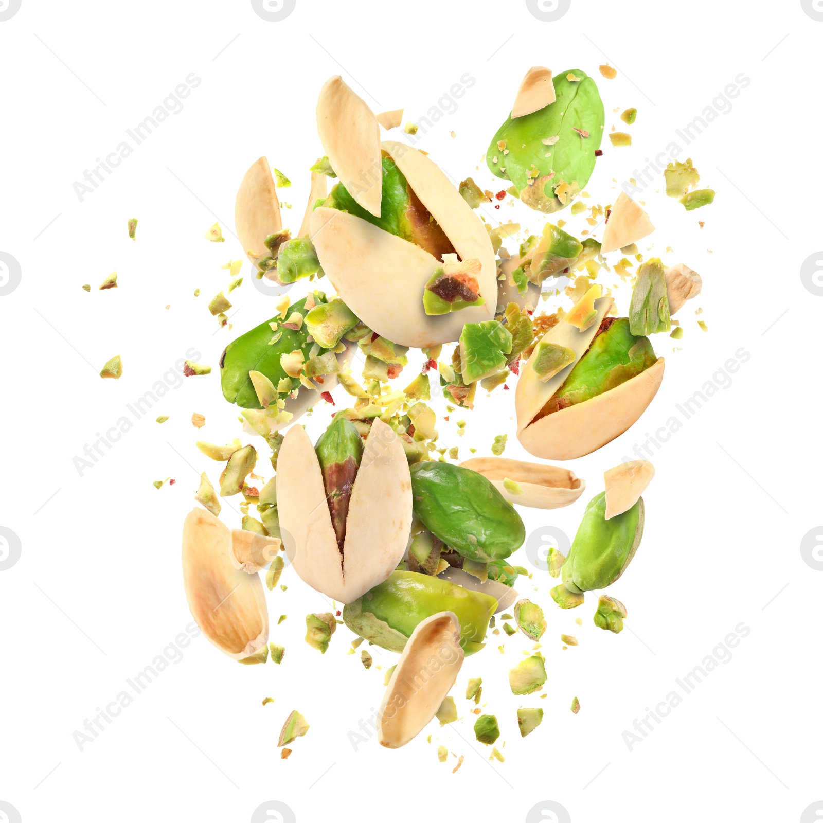 Image of Tasty pistachios with cracked nutshell in air on white background