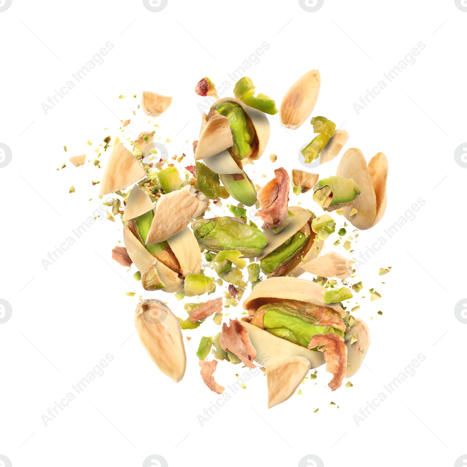 Image of Tasty pistachios with cracked nutshell in air on white background