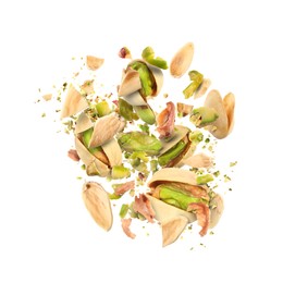 Image of Tasty pistachios with cracked nutshell in air on white background