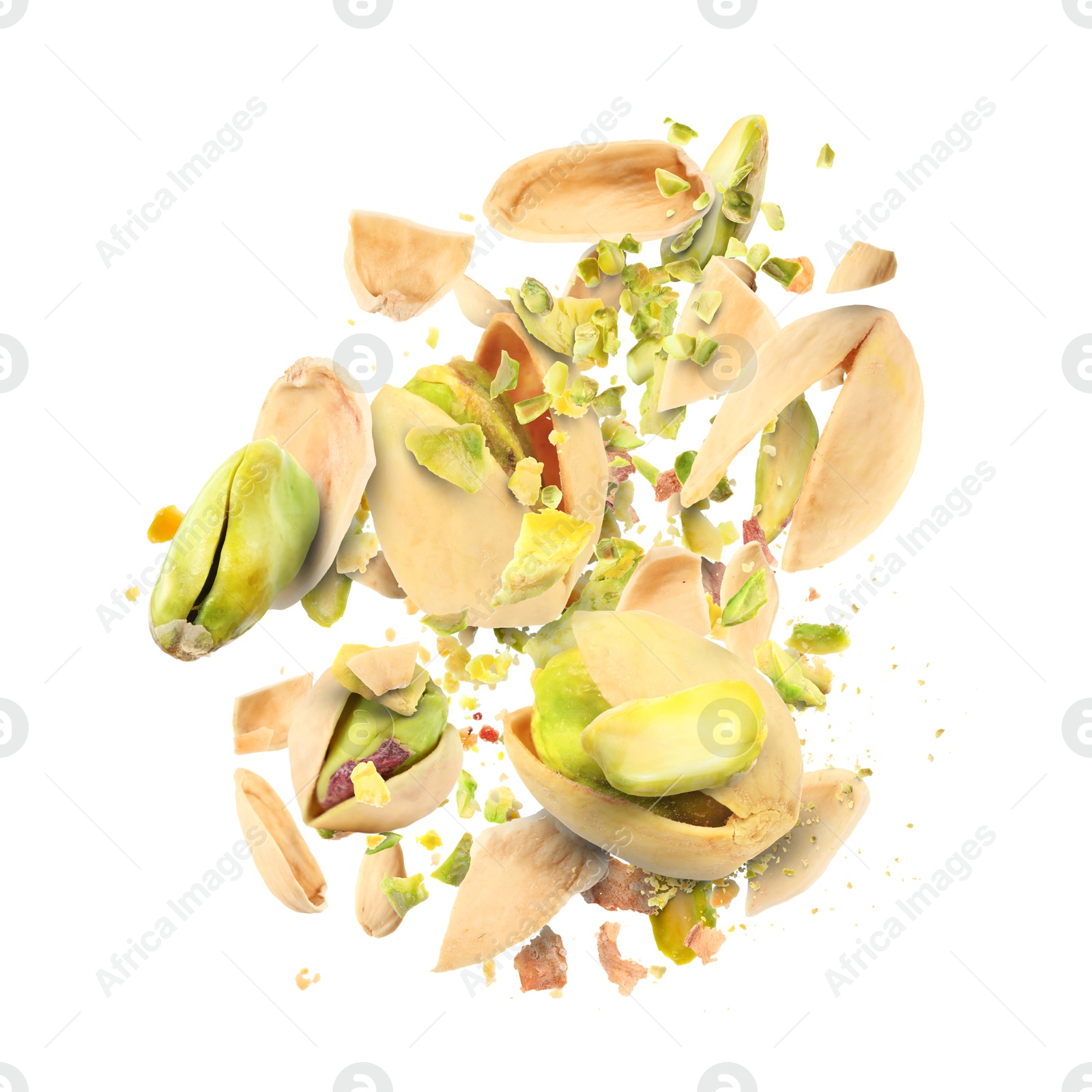 Image of Tasty pistachios with cracked nutshell in air on white background