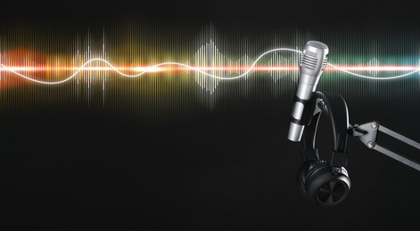 Illustration of Sound wave, microphone and headphones on black background. Banner design