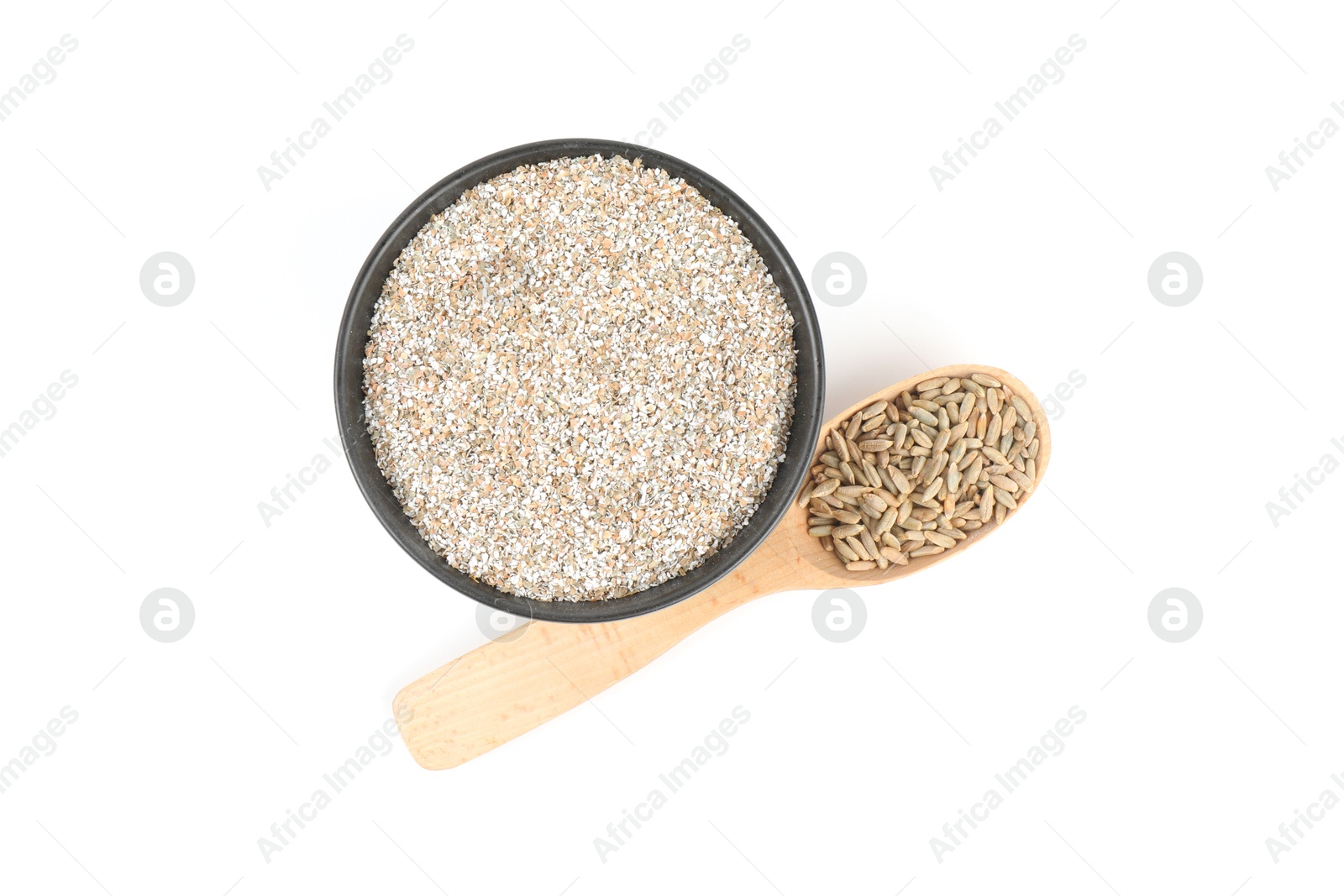 Photo of Rye bran in bowl and spoon isolated on white, top view