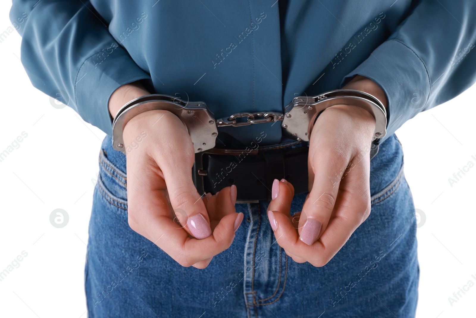 Photo of Woman in metal handcuffs on white background, closeup