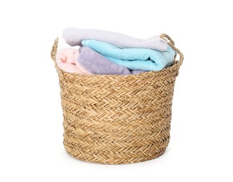 Photo of Wicker basket full of laundry isolated on white