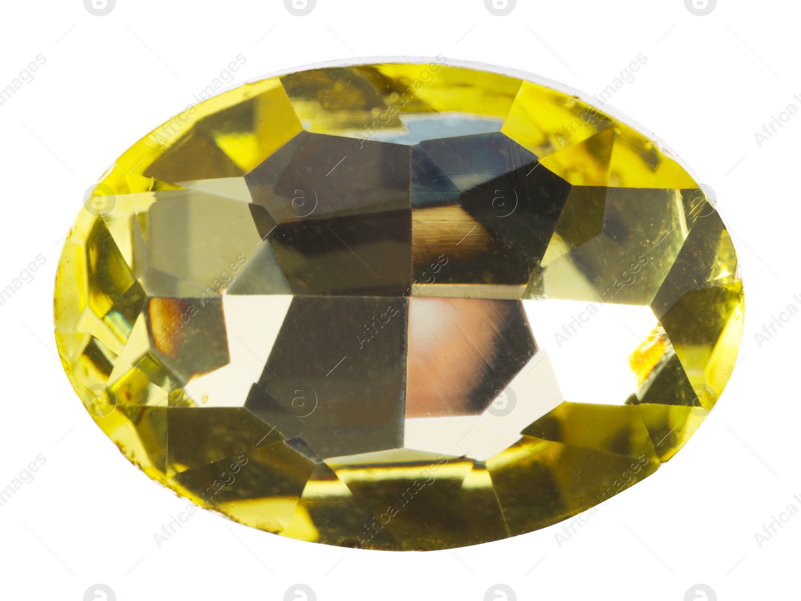 Photo of One yellow shiny gemstone isolated on white