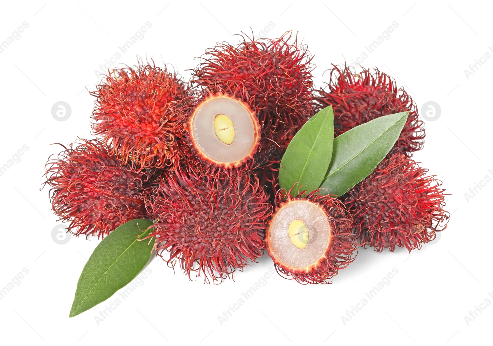 Photo of Delicious ripe rambutans and green leaves isolated on white. Exotic fruit