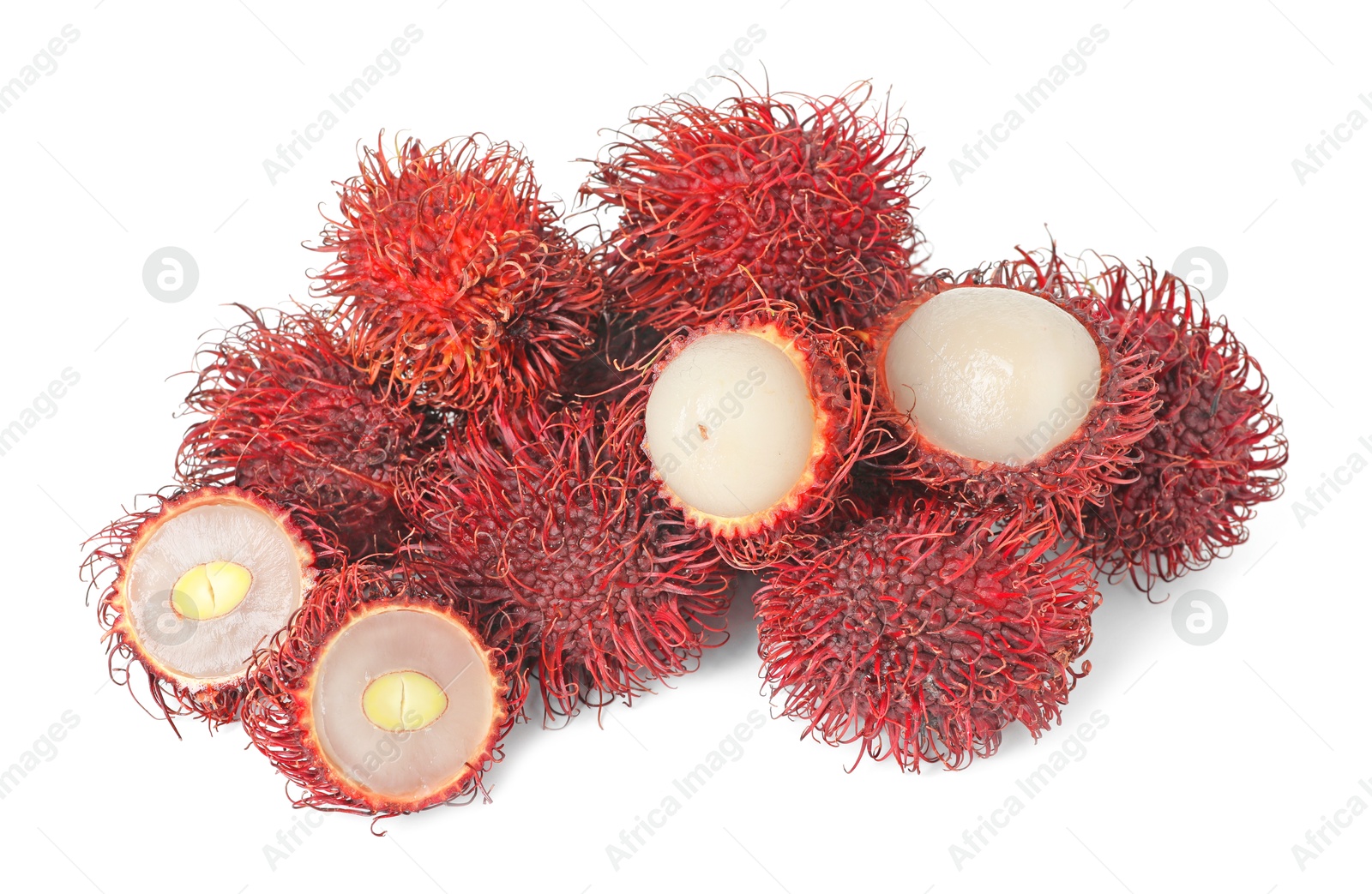 Photo of Delicious ripe rambutans isolated on white. Exotic fruit