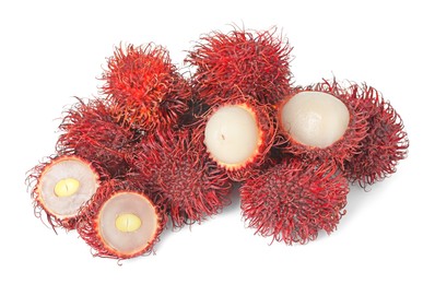 Photo of Delicious ripe rambutans isolated on white. Exotic fruit