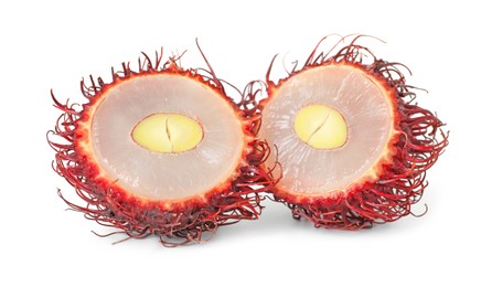 Photo of Halves of ripe rambutan isolated on white. Exotic fruit