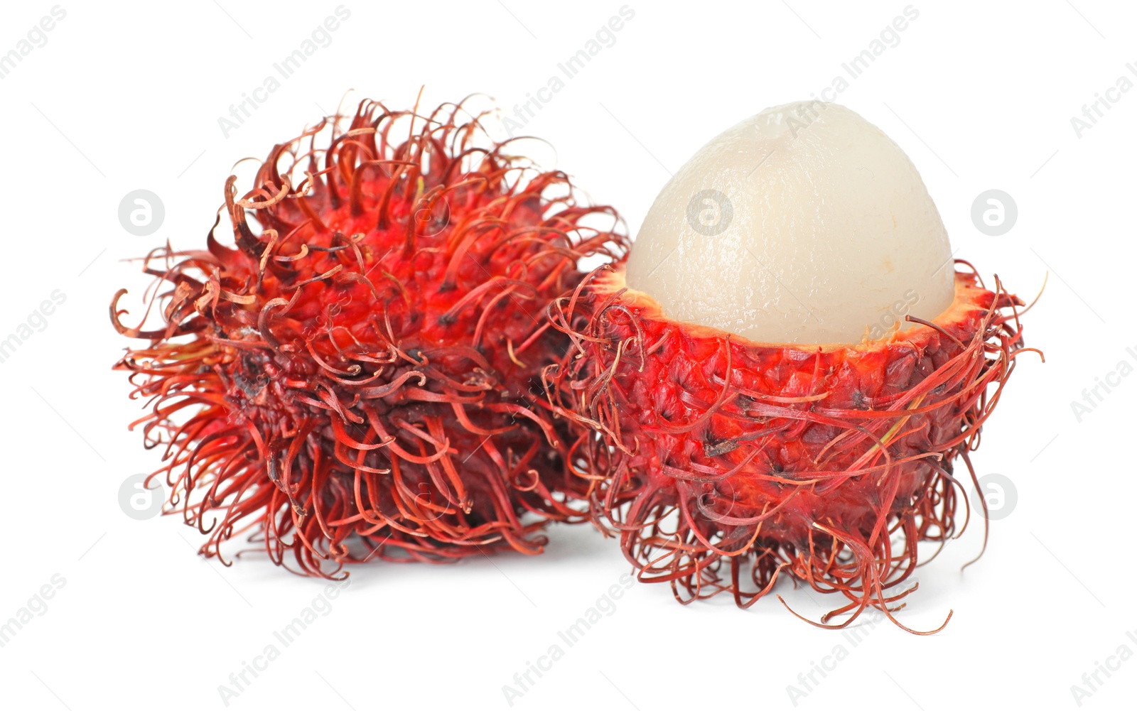 Photo of Delicious ripe rambutans isolated on white. Exotic fruit