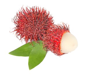 Photo of Delicious ripe rambutans and green leaves isolated on white. Exotic fruit