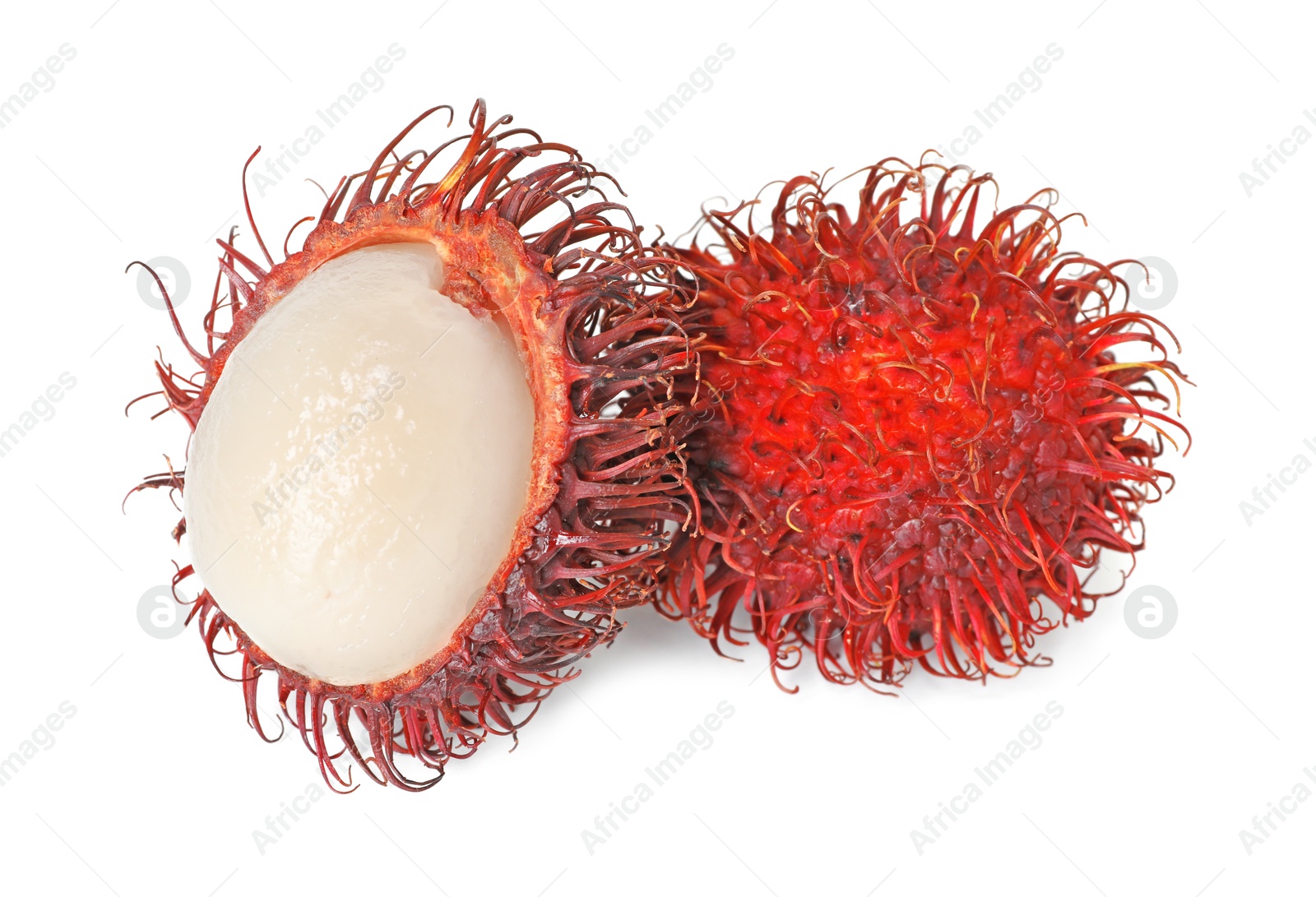 Photo of Delicious ripe rambutans isolated on white. Exotic fruit