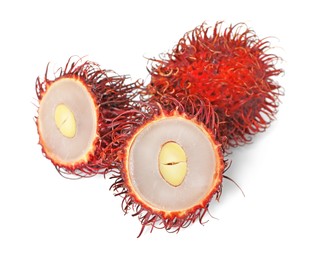 Photo of Delicious ripe rambutans isolated on white. Exotic fruit