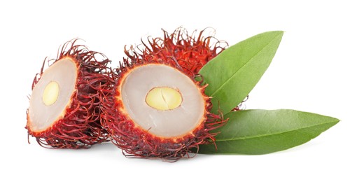 Photo of Delicious ripe rambutans and green leaves isolated on white. Exotic fruit