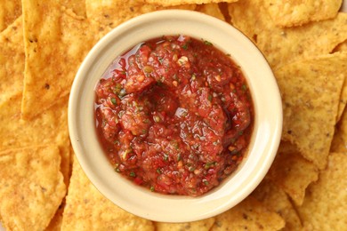 Delicious homemade salsa with nachos, top view