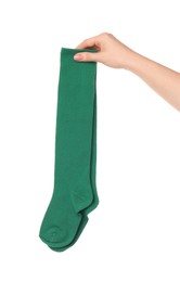 Photo of Woman holding pair of green socks on white background, closeup