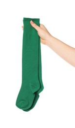 Photo of Woman holding pair of green socks on white background, closeup