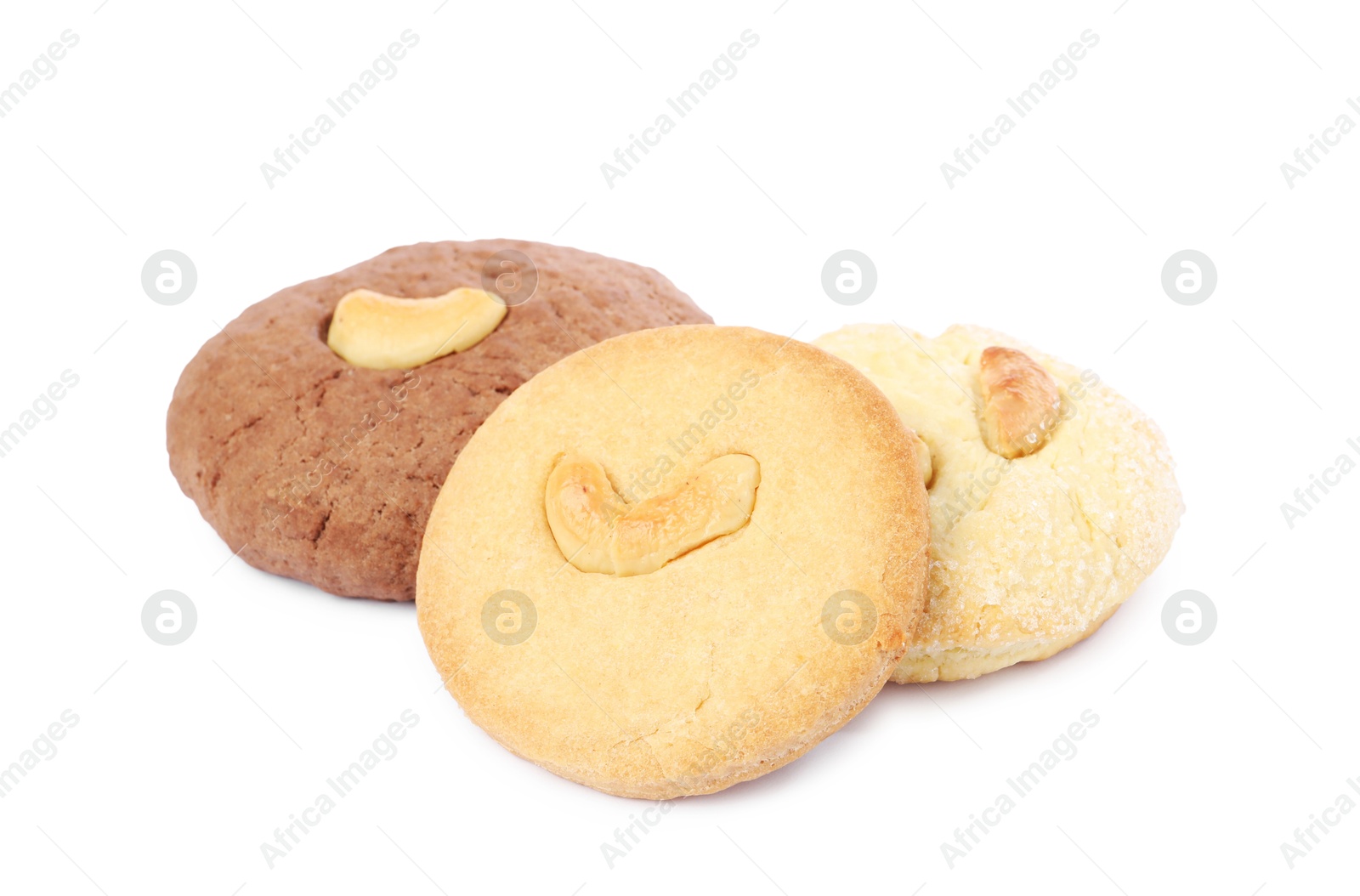 Photo of Different tasty cashew cookies isolated on white