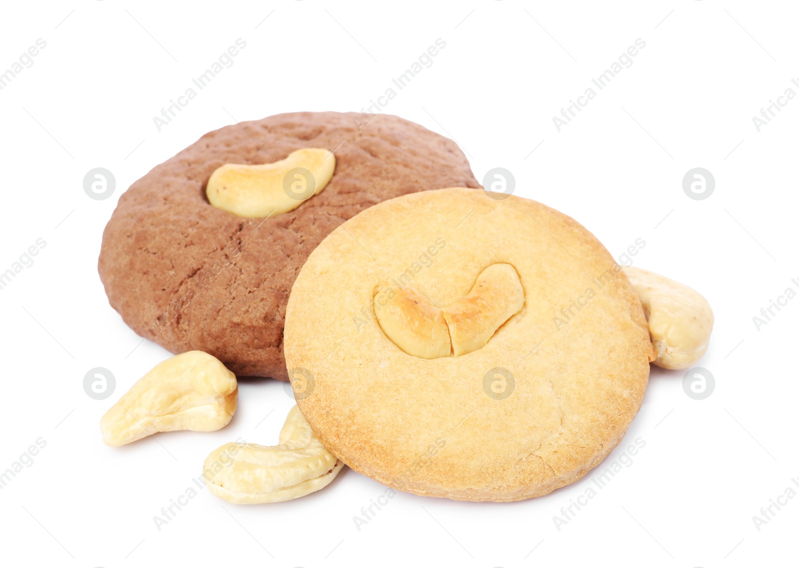 Photo of Different tasty cashew cookies isolated on white