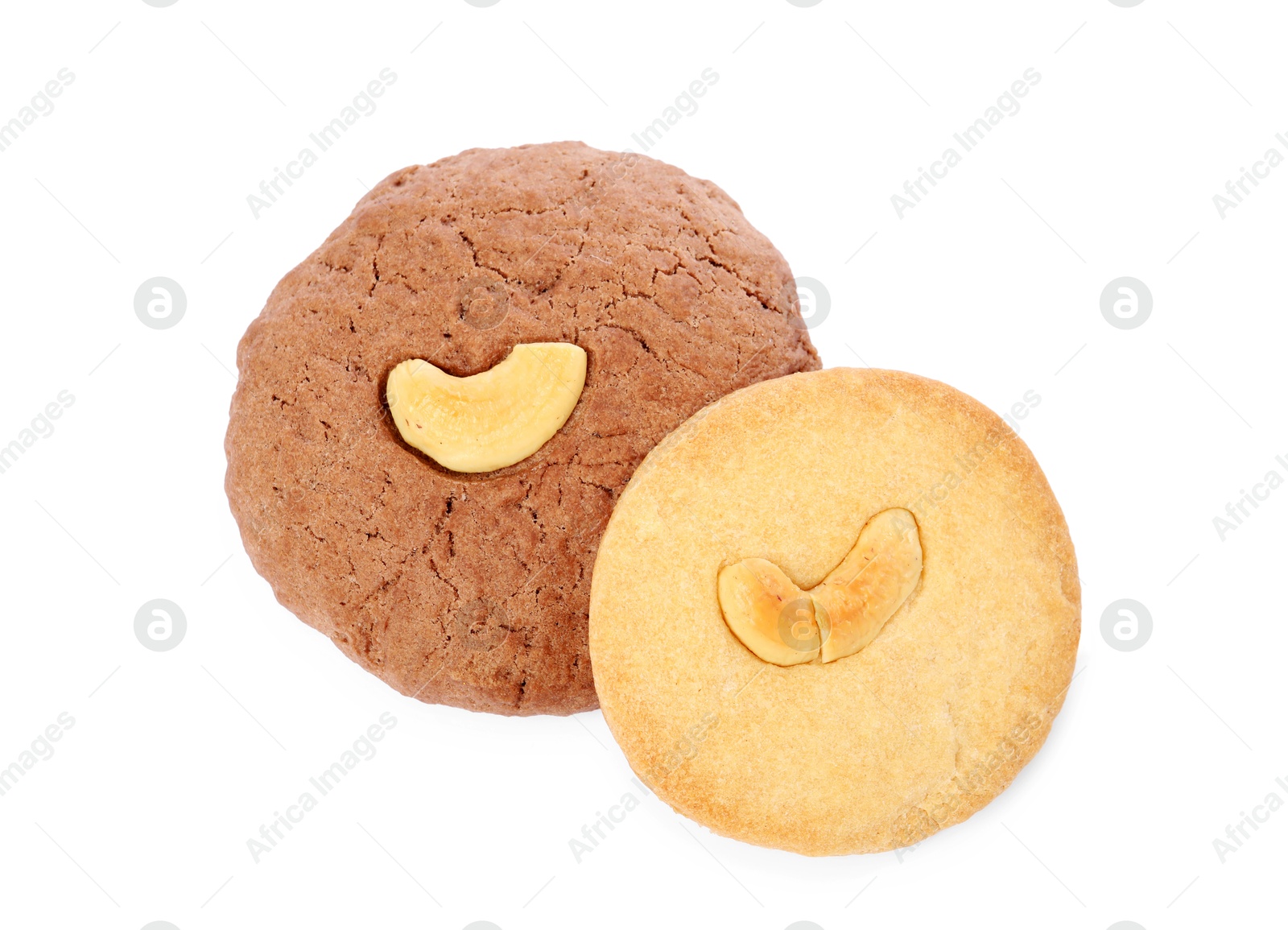 Photo of Different tasty cashew cookies isolated on white, top view