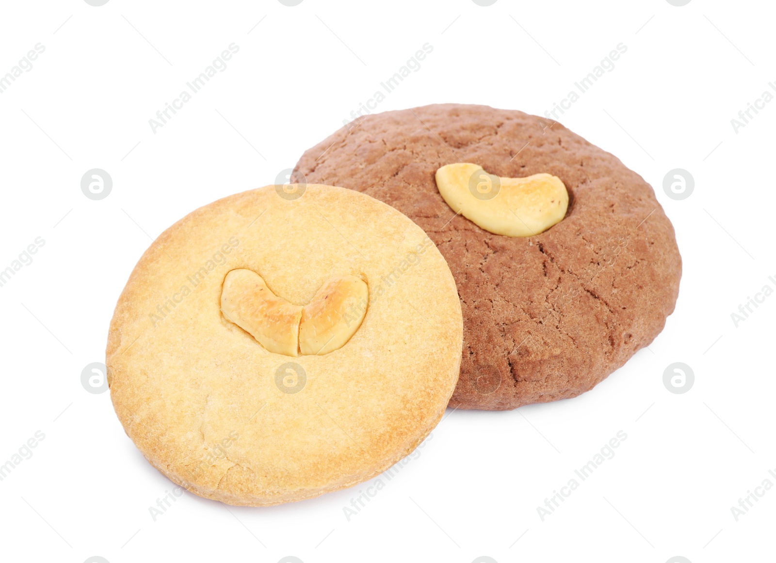 Photo of Different tasty cashew cookies isolated on white