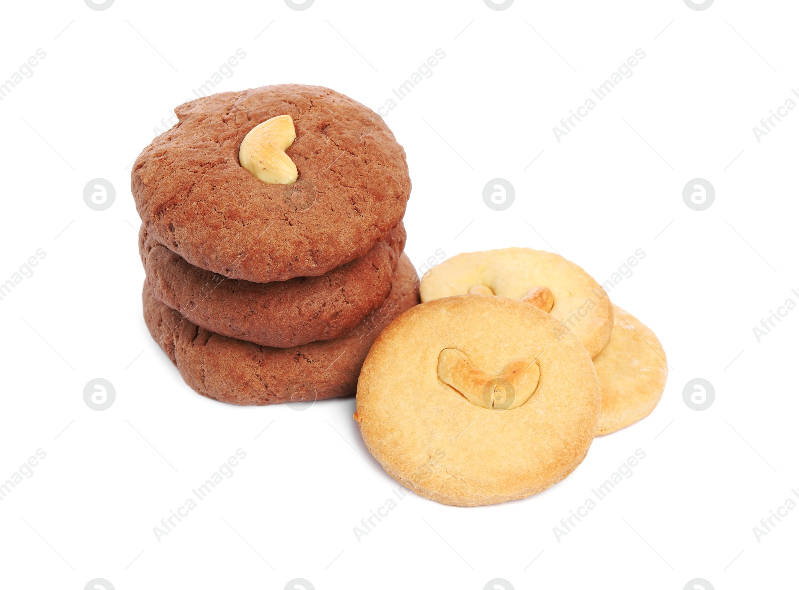 Photo of Different tasty cashew cookies isolated on white