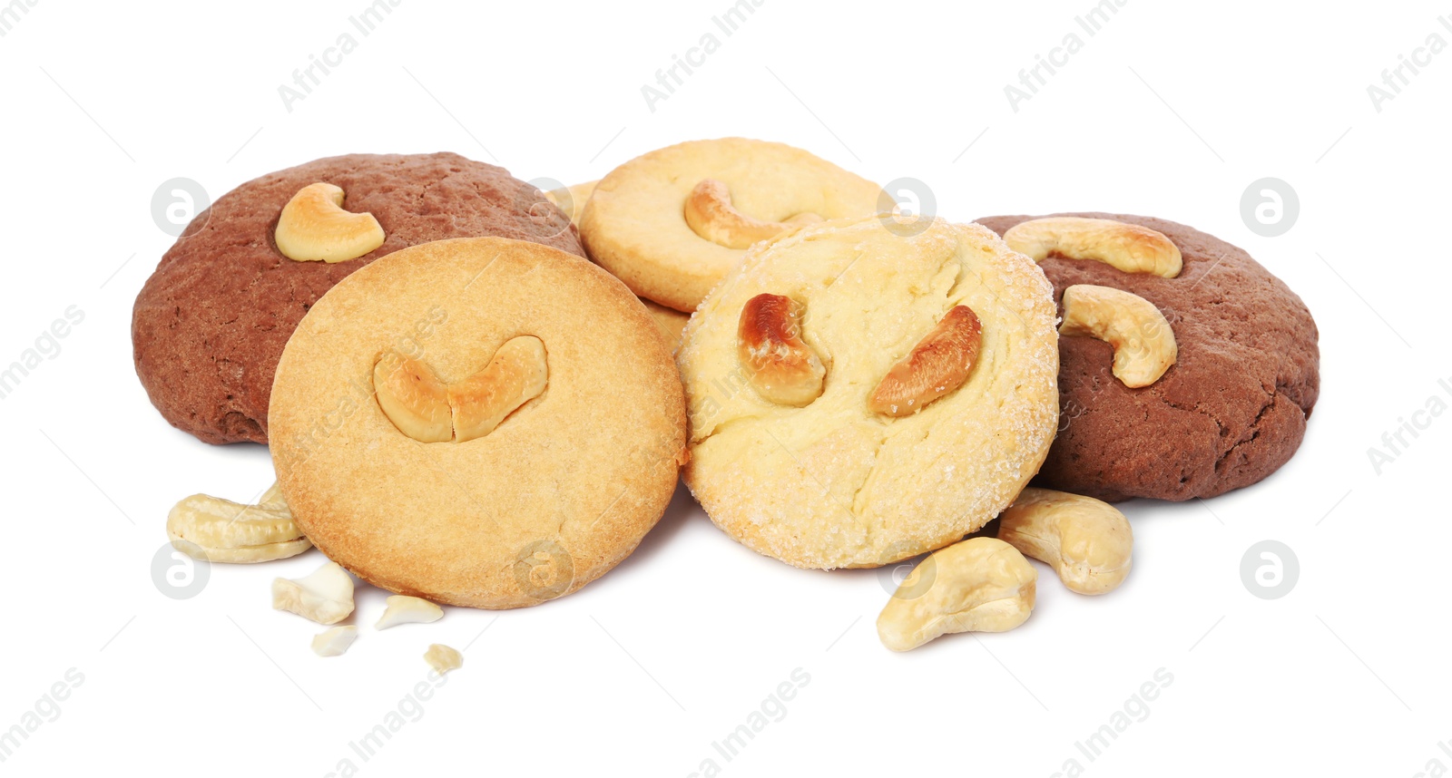 Photo of Different tasty cashew cookies isolated on white