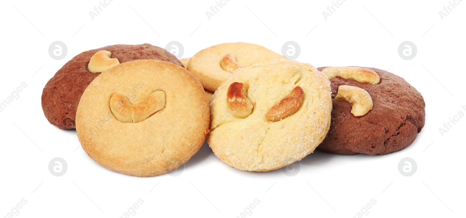 Photo of Different tasty cashew cookies isolated on white