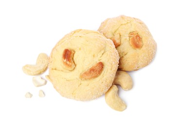 Photo of Tasty cashew cookies and nuts isolated on white