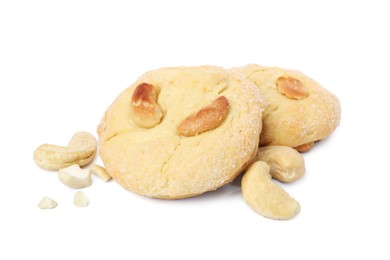 Photo of Tasty cashew cookies and nuts isolated on white