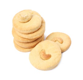 Photo of Many tasty cashew cookies isolated on white