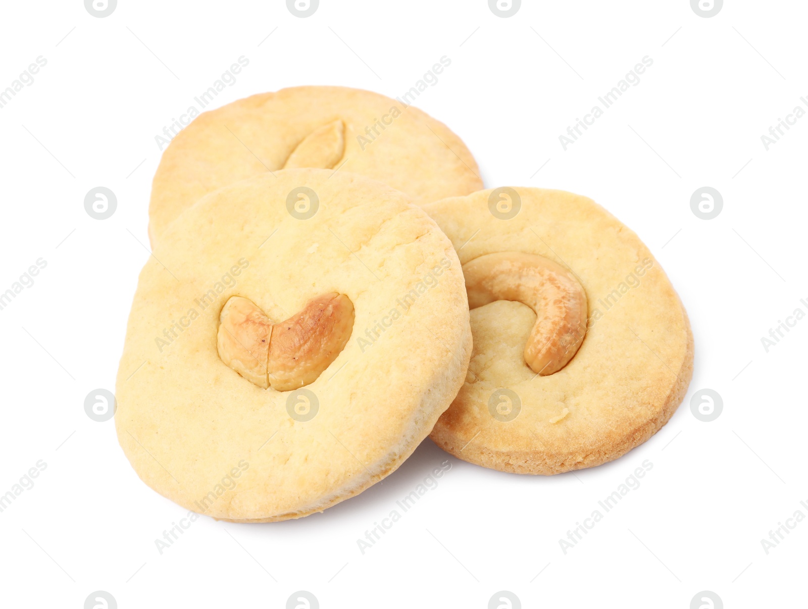 Photo of Three tasty cashew cookies isolated on white