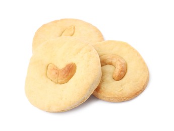 Photo of Three tasty cashew cookies isolated on white