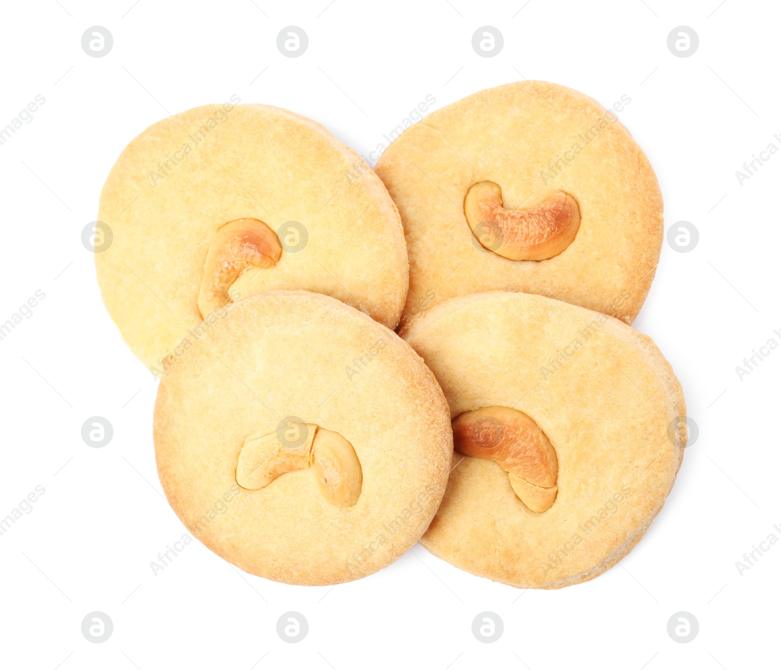 Photo of Tasty cashew cookies isolated on white, top view