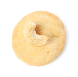 Photo of One tasty cashew cookie isolated on white, top view