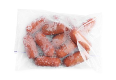 Photo of Frozen sausages in plastic bag isolated on white, top view