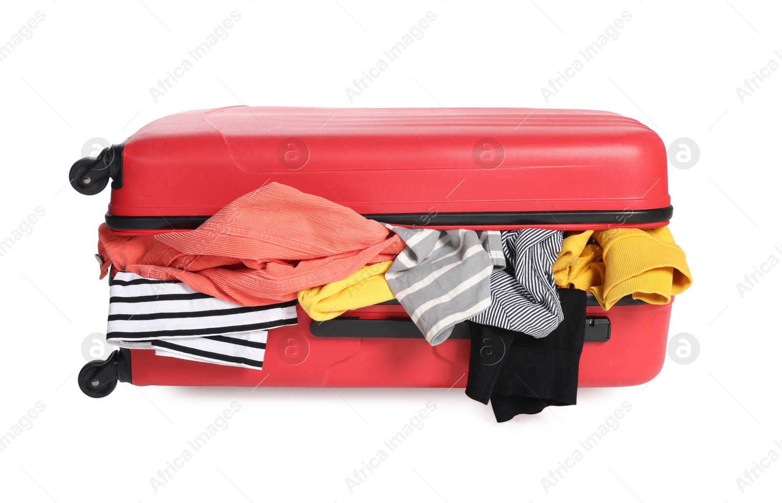 Photo of Packed suitcase full of clothes isolated on white