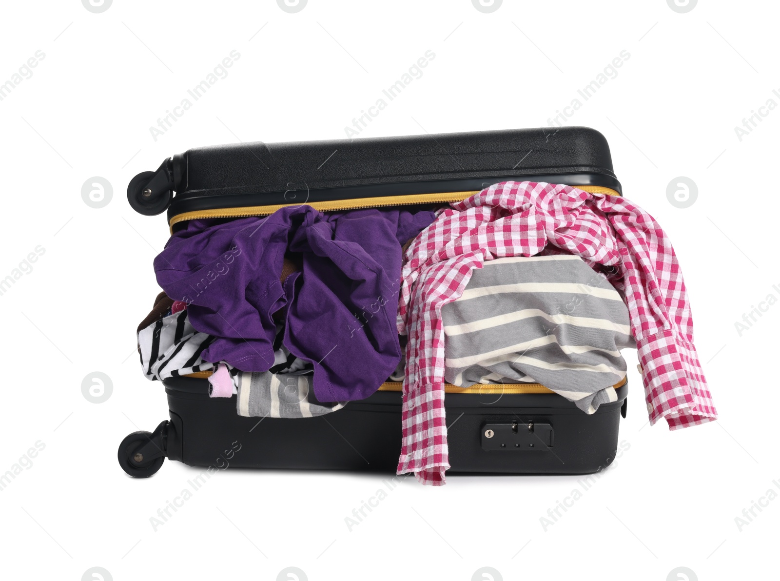 Photo of Packed suitcase full of clothes isolated on white