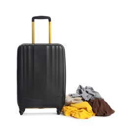 Photo of Black suitcase and messy pile of clothes isolated on white