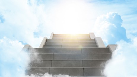 Image of Staircase among clouds leading towards light in sky. Banner design