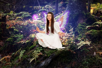 Charming fairy with magic wand in forest. Mesmerizing girl with ethereal wings