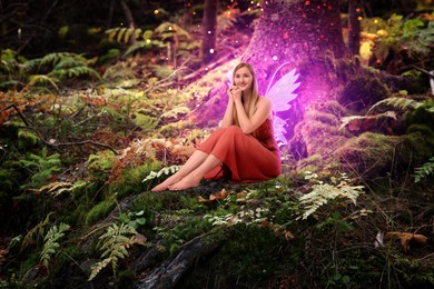 Image of Enchanting tiny fairy sitting near tree. Mesmerizing girl with ethereal wings