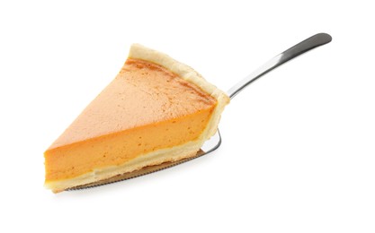 Photo of Piece of tasty homemade pumpkin pie and server isolated on white