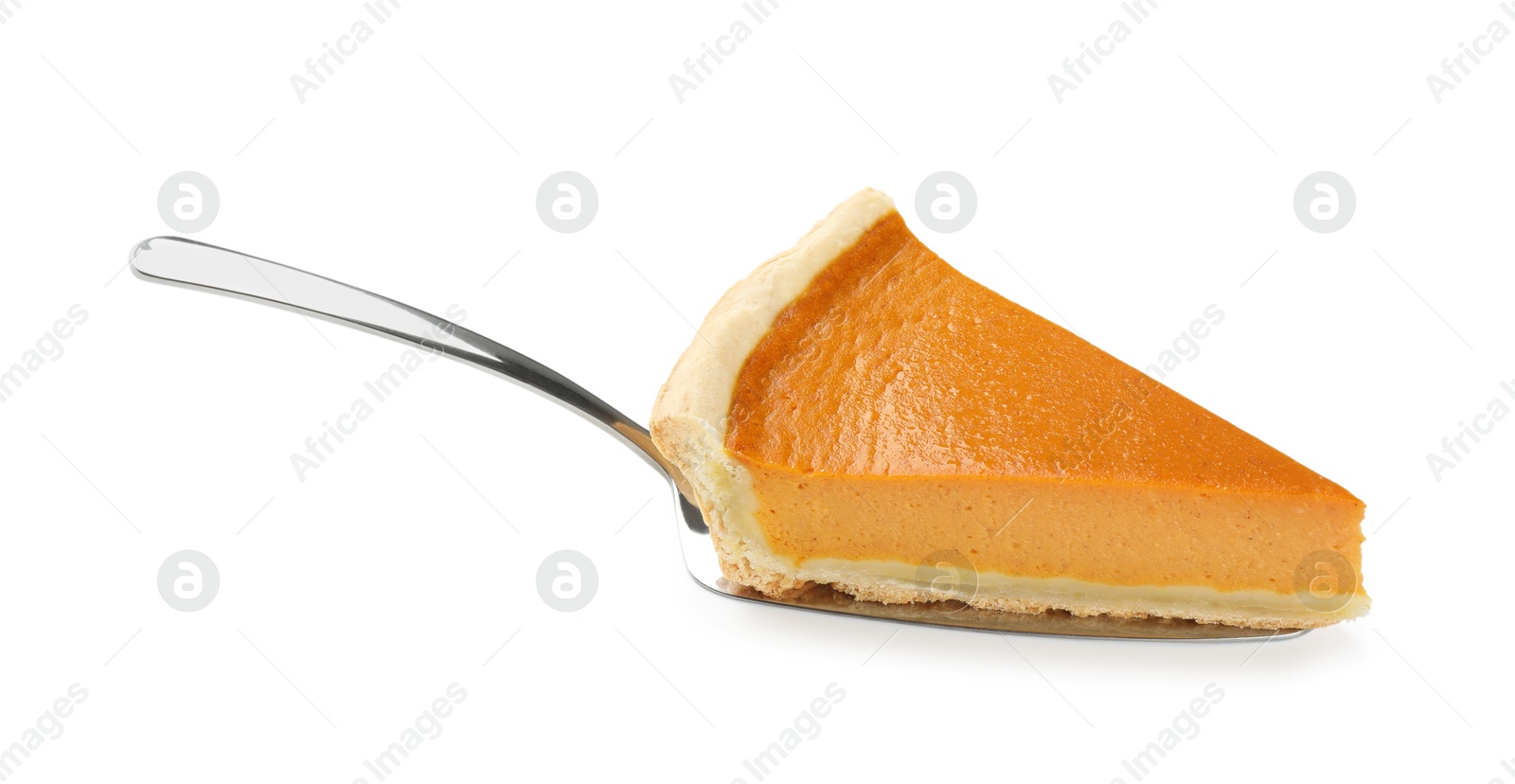 Photo of Piece of tasty homemade pumpkin pie and server isolated on white